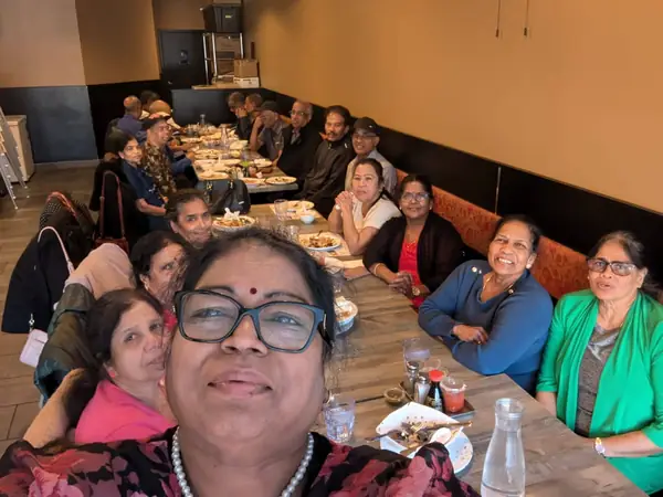 Selfie of people at a restaurant table